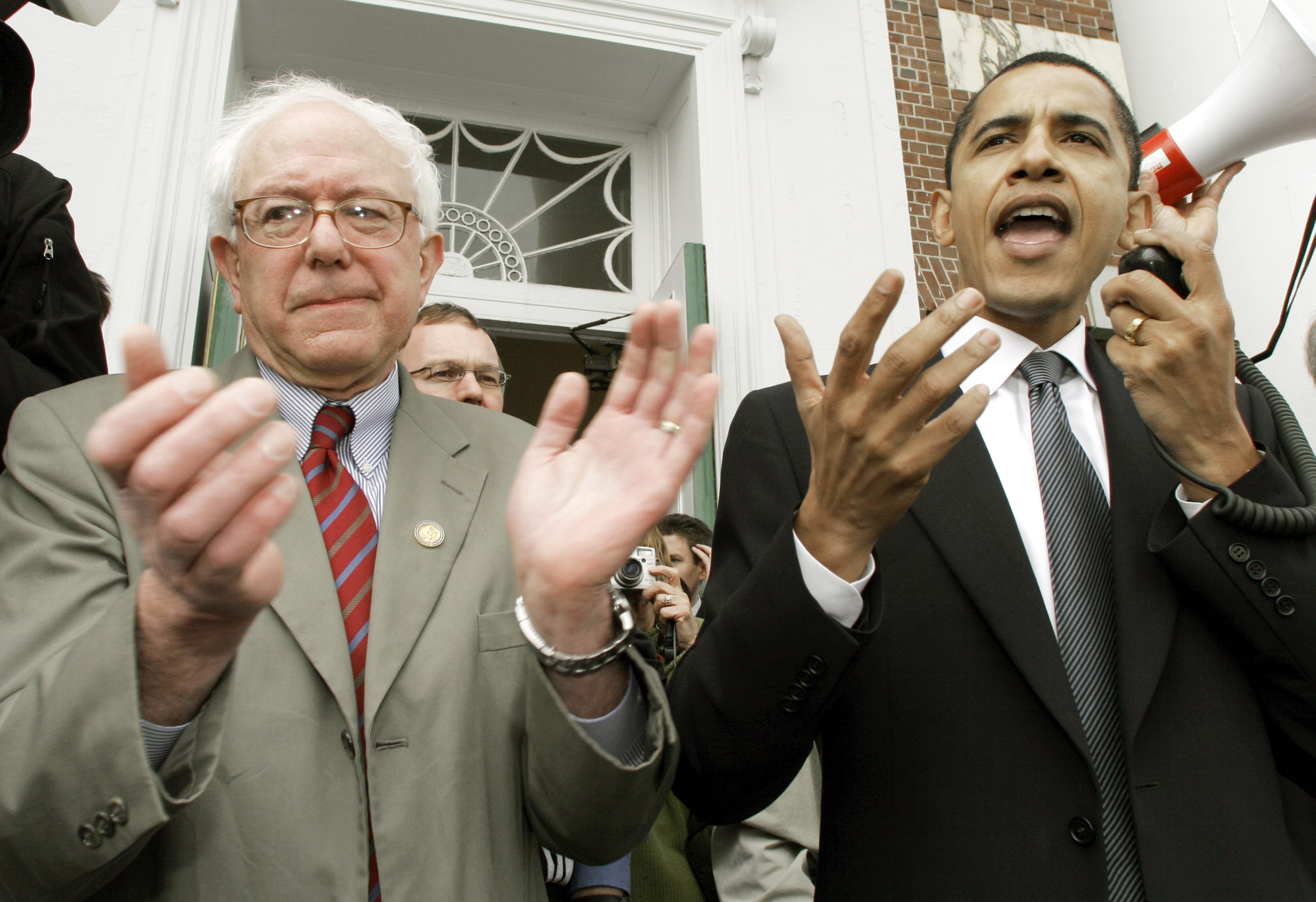 U.S. Sen. Barack Obama, D-Illinois, right, speaks at a Democratic rally in Burlington, Vt., Friday, March 10, 2006, to support Congressman Bernie Sanders, left, in his campaign for the U.S. Senate. Obama appeared at a raucous University of Vermont rally where he endorsed Sanders' bid and the Democratic campaign of Peter Welch, running for the U.S. House. (AP Photo/Toby Talbot)